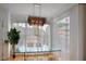 Charming dining area with a glass table, modern lighting, and lots of natural light at 200 Renaissance Ne Pkwy # 219, Atlanta, GA 30308