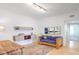 Living room with hardwood floors and modern shelving at 200 Renaissance Ne Pkwy # 219, Atlanta, GA 30308