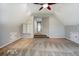 Spacious bonus room with neutral walls and carpet and recessed lighting and access to attic storage at 222 Chadmore Ln, Tyrone, GA 30290