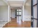 Inviting home foyer with hardwood floors and neutral paint at 222 Chadmore Ln, Tyrone, GA 30290