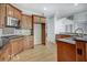 Kitchen featuring wood cabinets, granite countertops, and stainless steel appliances at 222 Chadmore Ln, Tyrone, GA 30290