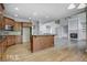 Open floor plan with kitchen island flowing into the living area at 222 Chadmore Ln, Tyrone, GA 30290