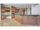 Spacious kitchen with wood cabinets and granite countertops at 222 Chadmore Ln, Tyrone, GA 30290