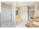 Bright bathroom features a bathtub, walk-in shower, and a double sink vanity at 2431 Rosedale Creek Dr, Snellville, GA 30078