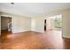 Spacious living room with wood floors and an open layout, perfect for entertaining and comfortable living at 2431 Rosedale Creek Dr, Snellville, GA 30078