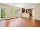 Living room area shows hardwood floors, a large window and updated fixtures at 2431 Rosedale Creek Dr, Snellville, GA 30078