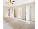 Spacious main bedroom features neutral carpet, closet, and adjacent bathroom at 2431 Rosedale Creek Dr, Snellville, GA 30078