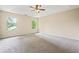 Spacious main bedroom features large windows providing natural light at 2431 Rosedale Creek Dr, Snellville, GA 30078
