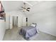 Cozy bedroom with vaulted ceilings, neutral paint, ceiling fan, and carpet at 2964 Greyhawk Ln # 160, Cumming, GA 30040