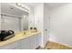 Bright bathroom with modern vanity, neutral color palette, and shower/tub combo at 2964 Greyhawk Ln, Cumming, GA 30040