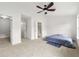 Large bedroom with three doors for easy accessibility and flexible furniture arrangement at 2964 Greyhawk Ln, Cumming, GA 30040