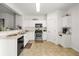 Well-lit kitchen equipped with stainless steel appliances and a cozy design at 2964 Greyhawk Ln, Cumming, GA 30040