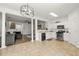 Open-concept living and kitchen area with updated appliances at 2964 Greyhawk Ln, Cumming, GA 30040