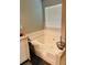 An oversized soaking tub offers a private retreat in the main bathroom at 3233 Rockmill Dr, Ellenwood, GA 30294