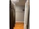 Spacious closet with built-in shelf and wooden floors at 3233 Rockmill Dr, Ellenwood, GA 30294