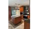 Charming kitchen featuring an island with granite countertops, stainless steel appliances, and stylish backsplash at 3233 Rockmill Dr, Ellenwood, GA 30294