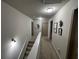 Upstairs hallway with carpet, decor and several doors at 370 Winston Cir, Canton, GA 30114