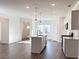 Modern kitchen with an island, stainless steel appliances, and an open floor plan at 3865 Shelleydale Dr # 82, Powder Springs, GA 30127