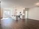 Open-concept living area featuring hardwood floors and an updated kitchen at 3865 Shelleydale Dr # 82, Powder Springs, GA 30127