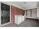 Enclosed laundry room with full-sized machines and water heater, conveniently located near the back door at 3561 Clay Rd, Austell, GA 30106
