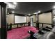 Comfortable home theater with a large screen and leather recliners for the ultimate viewing experience at 4130 Millbrook Ct, Suwanee, GA 30024