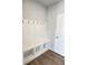 Mud room with built-in bench and storage, offering an organized transition space from garage at 2674 Mourning Dove Drive (Lot 37), Grayson, GA 30017