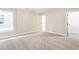 Bedroom with a window and a view of an enclosed closet at 148 Palm St, Holly Springs, GA 30115