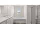 Bright bathroom featuring a soaking tub, separate shower, and modern fixtures for a spa-like experience at 1628 Palladian Dr, Lithonia, GA 30058