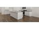 Bright kitchen features granite countertops, stainless appliances, and spacious center island at 1628 Palladian Dr, Lithonia, GA 30058