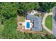The property features a pool and backyard gazebo surrounded by lush landscaping at 2065 Innsfail Dr, Snellville, GA 30078