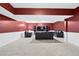 Cozy basement recreation room with comfortable seating, perfect for relaxation and entertainment at 2065 Innsfail Dr, Snellville, GA 30078