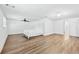Bright basement bedroom featuring modern wood flooring and ample space for a comfortable retreat at 2065 Innsfail Dr, Snellville, GA 30078
