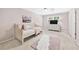 Cozy bedroom showcases a neutral color scheme with a comfortable bed and a bright window at 2065 Innsfail Dr, Snellville, GA 30078