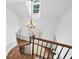 Foyer with a wooden staircase and a stunning chandelier at 2065 Innsfail Dr, Snellville, GA 30078