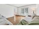 Comfortable living room features hardwood floors and neutral paint at 2065 Innsfail Dr, Snellville, GA 30078