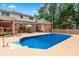 Inviting pool area with plenty of space for sunbathing and relaxing poolside at 2065 Innsfail Dr, Snellville, GA 30078