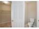 Bathroom view to a water closet and closet at 655 Golden Meadows Ln, Suwanee, GA 30024