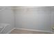 Spacious walk-in closet with shelving perfect for organizing clothes and accessories at 655 Golden Meadows Ln, Suwanee, GA 30024