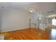 Open-concept living area with hardwood floors, and lots of natural light at 655 Golden Meadows Ln, Suwanee, GA 30024