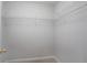 Well-organized walk-in closet featuring white wire shelving at 655 Golden Meadows Ln, Suwanee, GA 30024