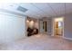 Finished basement featuring carpeted flooring, recessed lighting, and a full bathroom at 115 Flagstop Run, Fayetteville, GA 30215
