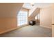 Brightly lit bedroom with carpet, trunk, and large window at 115 Flagstop Run, Fayetteville, GA 30215