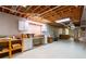 Spacious unfinished basement featuring exposed rafters at 115 Flagstop Run, Fayetteville, GA 30215