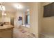 Spacious bathroom featuring a soaking tub, double vanity, and tiled floor at 2403 Wistful Way, Marietta, GA 30066