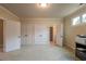 Bedroom with neutral carpet, 3 closets, and adjacent bathroom at 2403 Wistful Way, Marietta, GA 30066