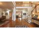 Grand foyer with soaring ceilings, hardwood floors, elegant staircase, and abundant natural light at 2403 Wistful Way, Marietta, GA 30066