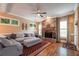 Cozy living room features a stone fireplace, hardwood floors, and large windows for natural light at 2403 Wistful Way, Marietta, GA 30066