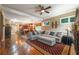 Open-concept living area connecting to the kitchen, featuring hardwood floors and ample seating at 2403 Wistful Way, Marietta, GA 30066