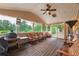 Covered patio with outdoor seating, ceiling fan and view of the backyard at 2403 Wistful Way, Marietta, GA 30066