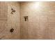 Tiled shower featuring a rainfall showerhead and built-in niche at 2403 Wistful Way, Marietta, GA 30066